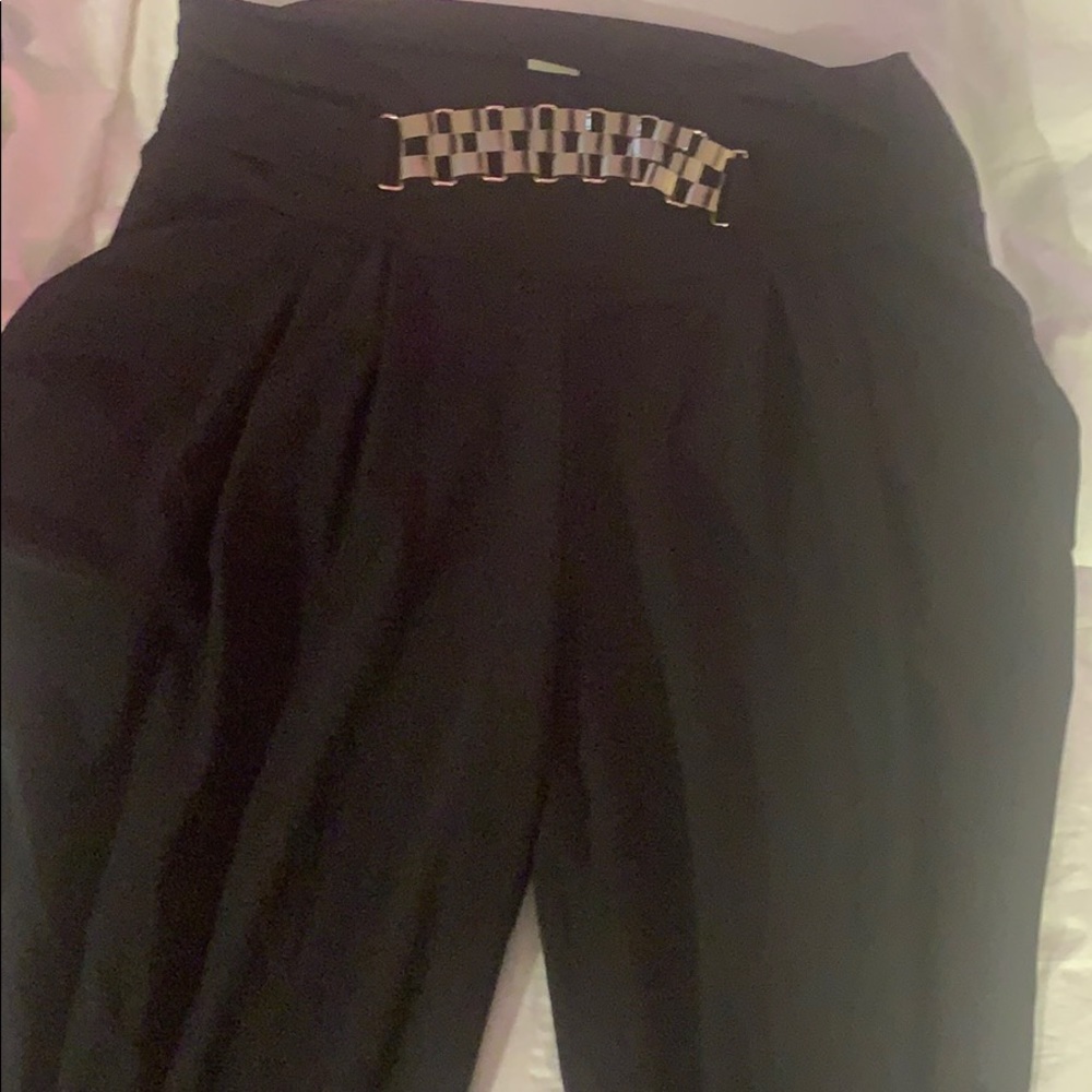 Black pants with gold belt